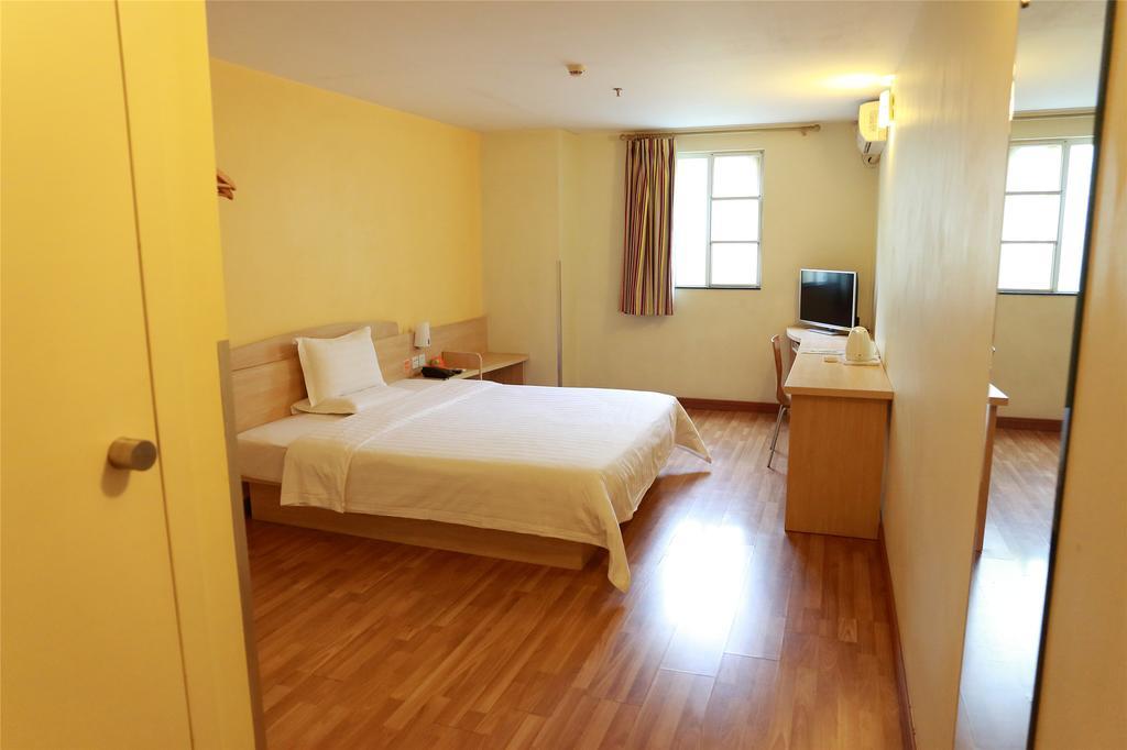 7Days Inn Qingdao Liuting Airport Номер фото