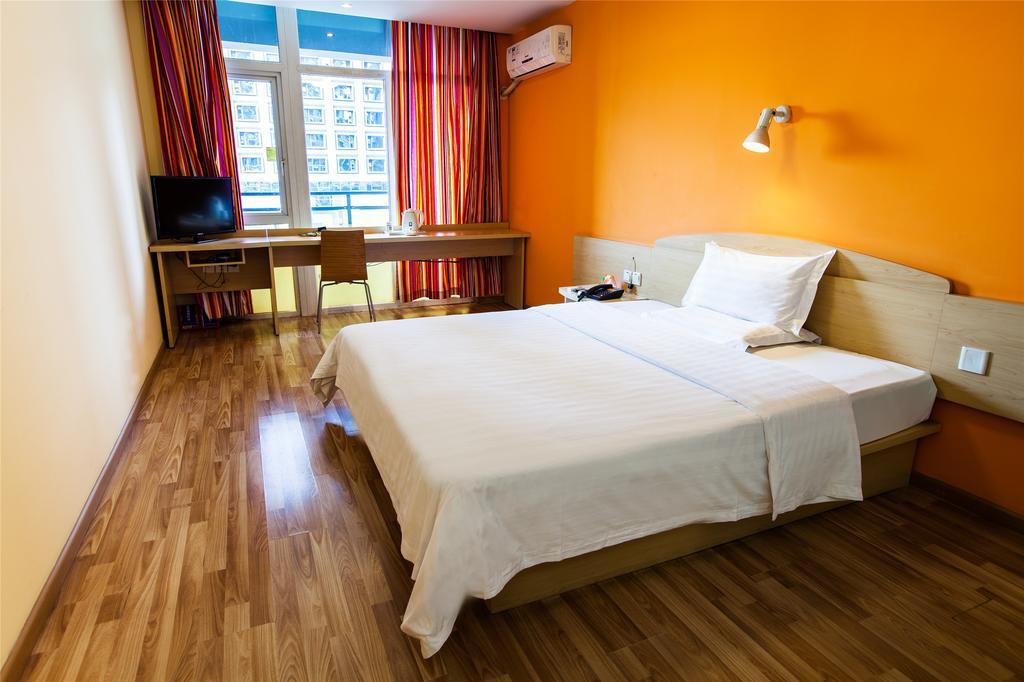 7Days Inn Qingdao Liuting Airport Номер фото